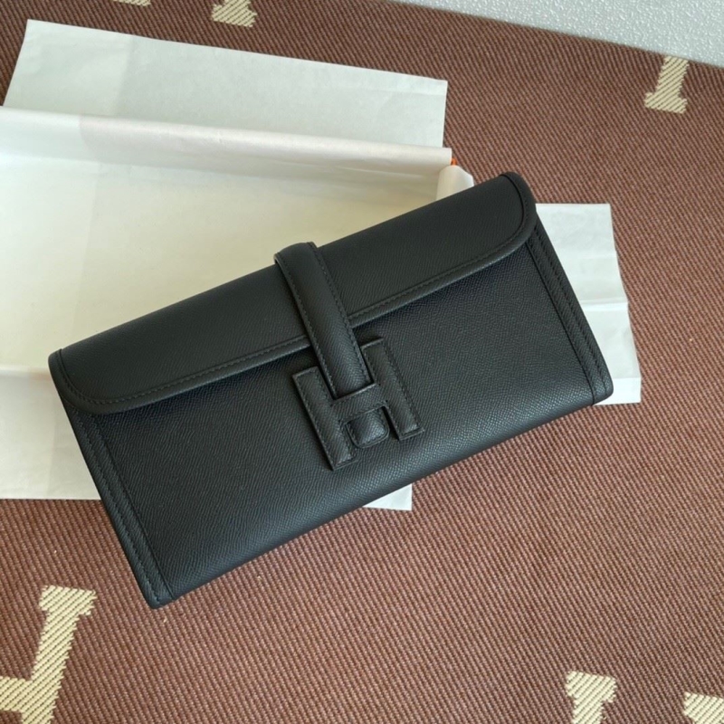 H**mes clutch bags